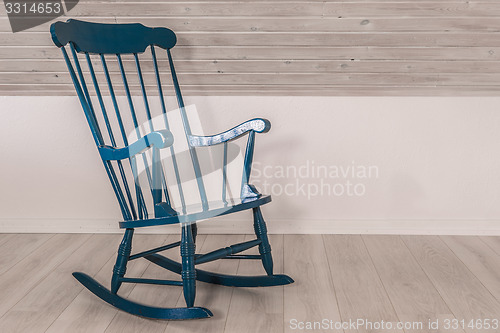 Image of Rocking chair in a living room