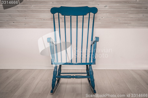 Image of Rocking chair on wooden floor