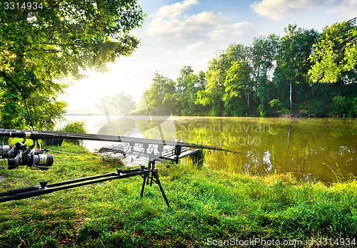 Image of Fishing rods near river