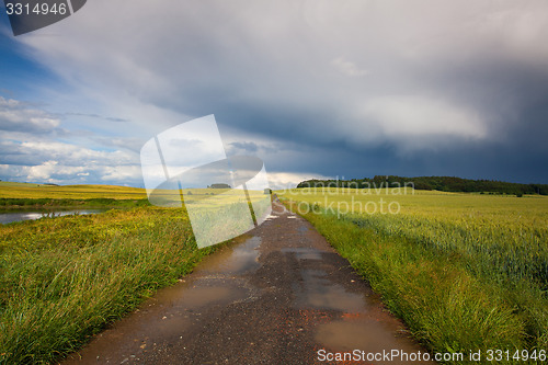 Image of Empty road and landscape after heavy storm