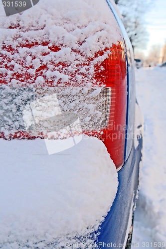 Image of Car bumper covered by snow