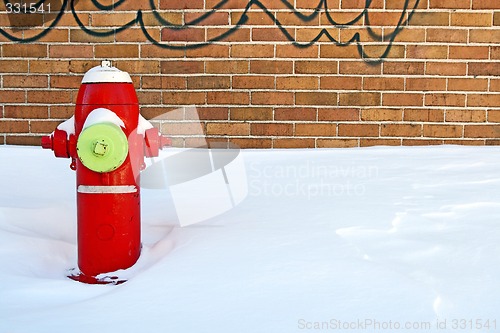 Image of Red fire hydrant in winter