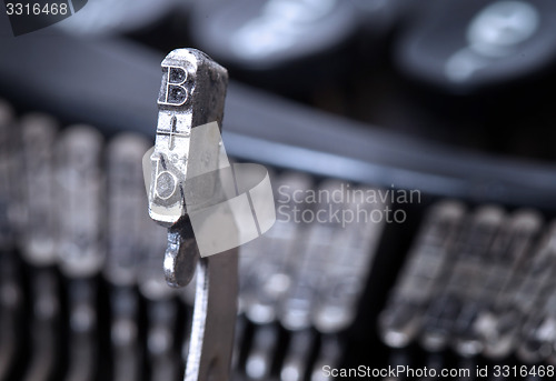 Image of B hammer - old manual typewriter - cold blue filter