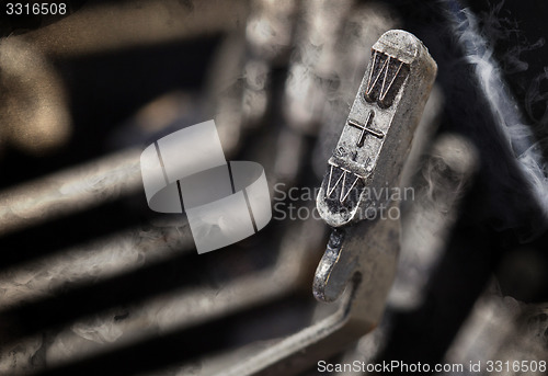 Image of W hammer - old manual typewriter - mystery smoke