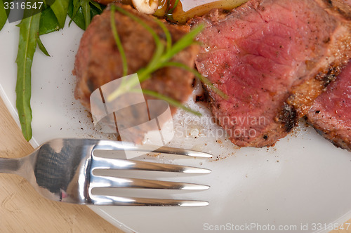 Image of beef filet mignon grilled with vegetables