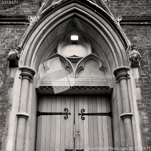 Image of wooden parliament in london old church door and marble antique  