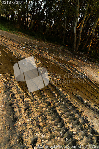 Image of Dirty broken rural road 