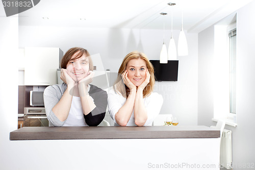 Image of Smiling Couple  In New Home