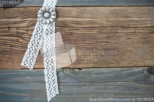 Image of vintage metal buttons flowers and lace tape