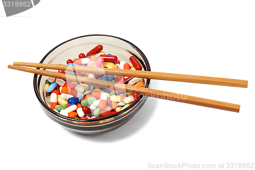 Image of Bowl with drugs and chopsticks