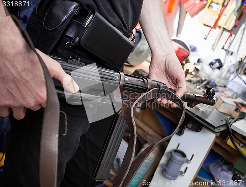 Image of MP38 in the hands of a master restorer