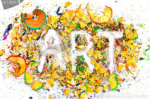 Image of art word on the background of pencil shavings