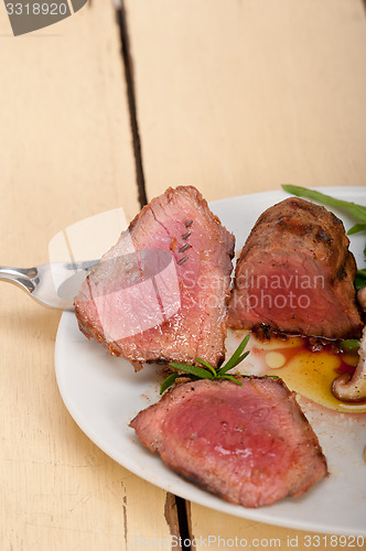 Image of beef filet mignon grilled with vegetables