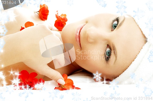 Image of red flower petals spa with snowflakes #3