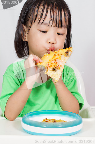 Image of Little Asain Chinese Eating Pizza