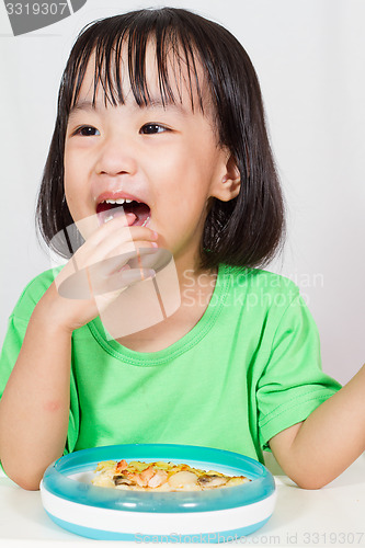 Image of Little Asain Chinese Eating Pizza