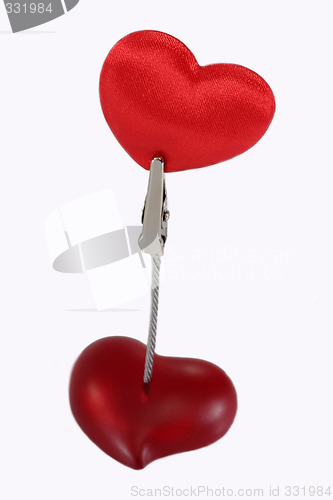 Image of Clamp holding a velvet heart