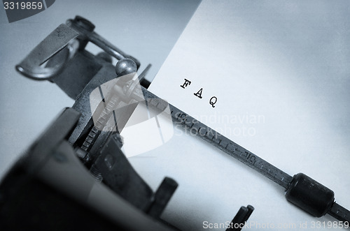 Image of Old typewriter with paper