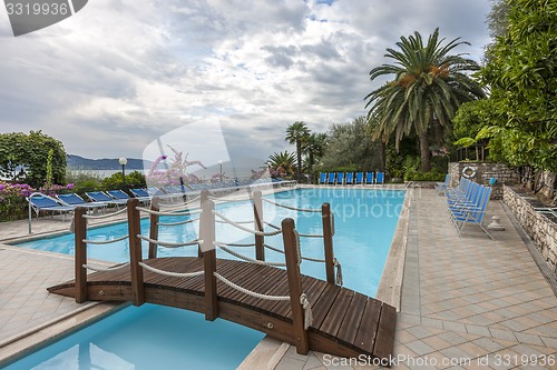 Image of Luxury swimming pool with beautiful views of Lake Garda in Italy