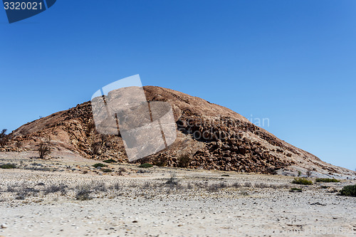 Image of Rock formation in Namib desert in sunset, landscape