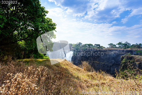 Image of The Victoria falls with mist from water