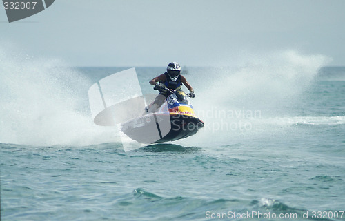 Image of Man racing a watercraft