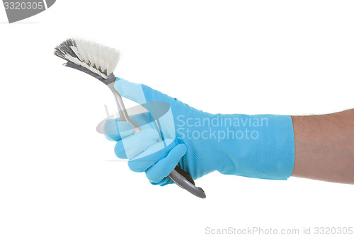 Image of Protection glove holding a dish-brush