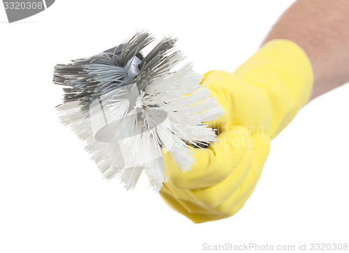 Image of Protection glove holding a dish-brush