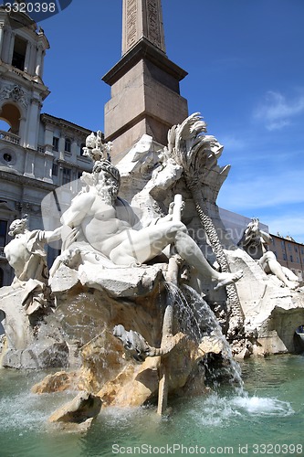 Image of Saint Agnese in Agone with Egypts obelisk in Piazza Navona, Rome