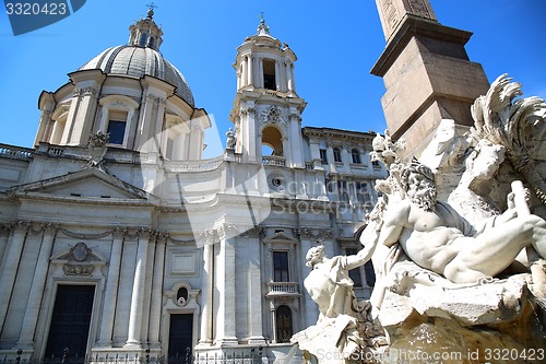 Image of Saint Agnese in Agone with Egypts obelisk in Piazza Navona, Rome