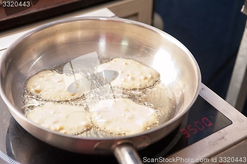 Image of Cooking corn pancakes