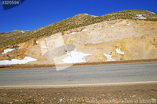 Image of hill in   africa wild angle asphalt street white line  ground is