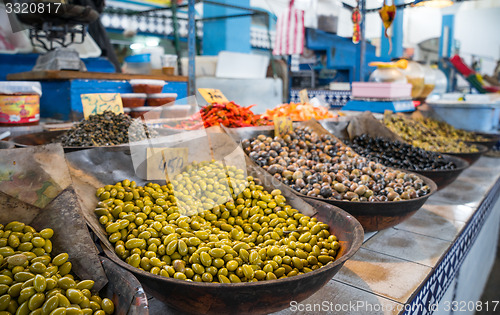 Image of Olives on market counter in Eastern country