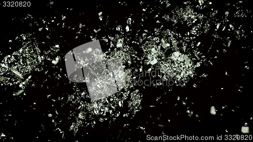 Image of Broken or cracked glass on black background