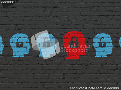 Image of Finance concept: head with padlock icon on wall background