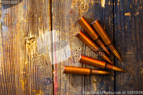 Image of five rifle cartridges