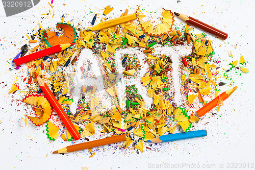 Image of colored pencils and inscription ART