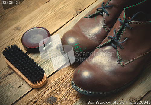 Image of boots brush and shoe polish