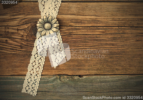 Image of vintage metal buttons flowers and lace tape