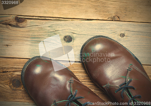 Image of Two brown boots