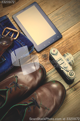 Image of traveler set with digitizer, rangefinder camera, woolen sweater 