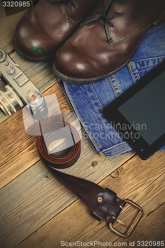 Image of traveler set with a leather belt, digitizer, rangefinder camera,