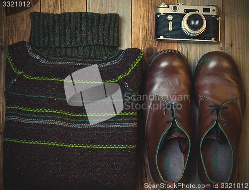 Image of Vintage wool sweater, shoes and antique rangefinder camera