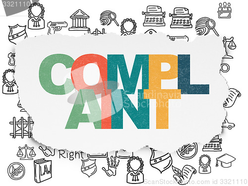Image of Law concept: Complaint on Torn Paper background