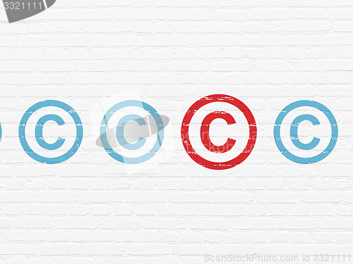 Image of Law concept: copyright icon on wall background