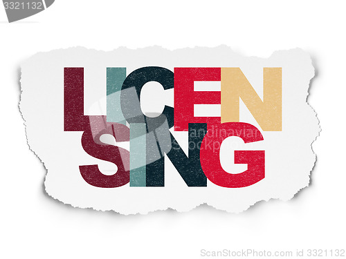 Image of Law concept: Licensing on Torn Paper background