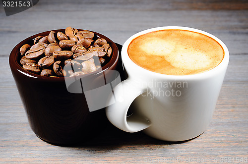 Image of espresso and cup of coffee beans