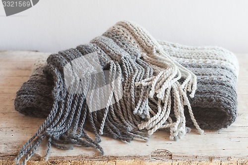 Image of wool grey scarf with tassels