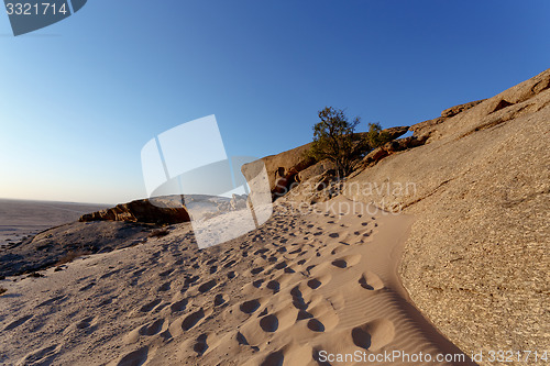 Image of Rock formation in Namib desert in sunset, landscape