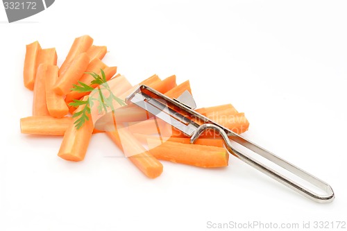 Image of Carrots cut by slices and a knife